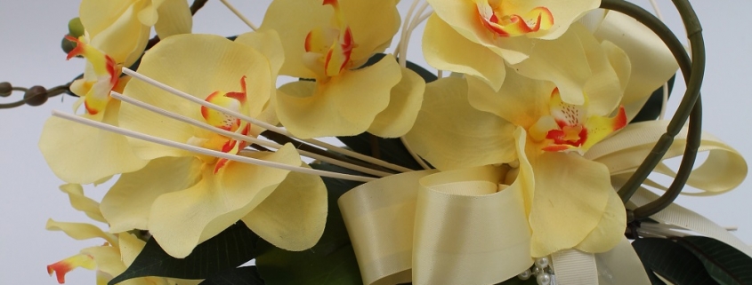 Orchidea Ramificata in vaso di vetro gialla